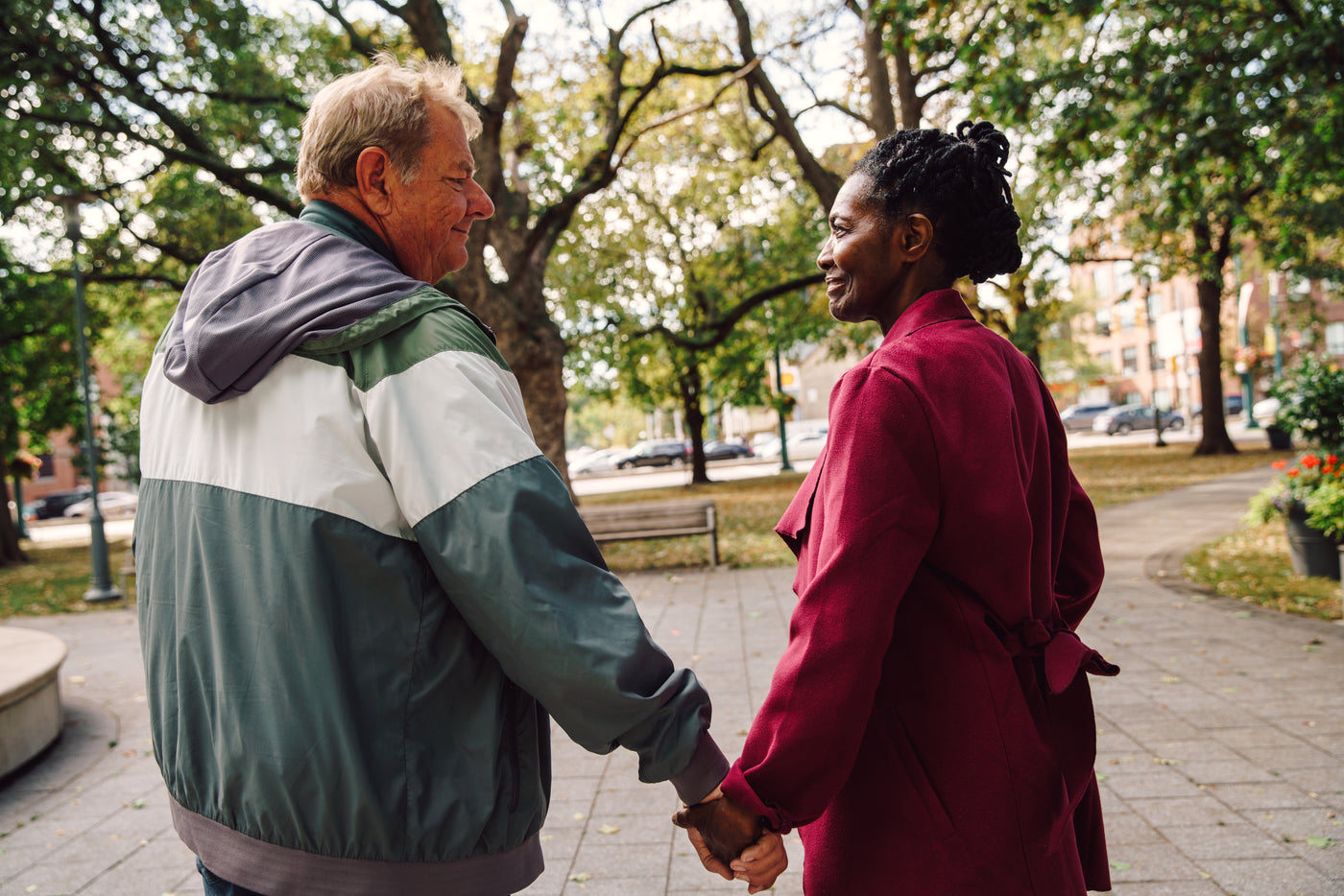 An active senior couple walking outdoors